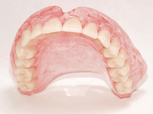 Достоинства и недостатки акриловых зубных протезов